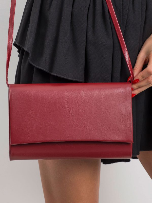 Dark red clutch bag