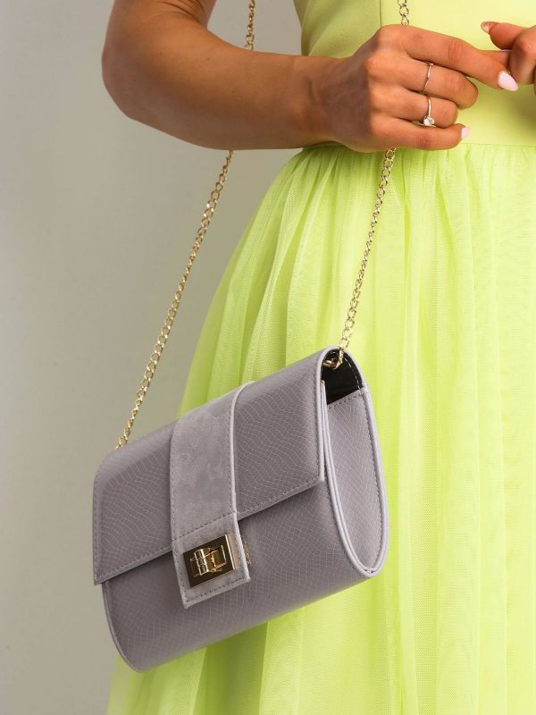 Gray clutch bag on a chain