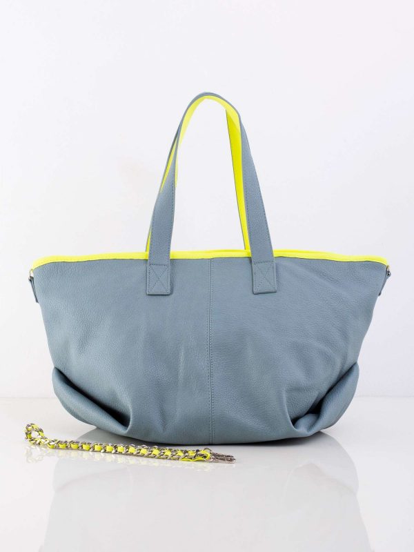 Blue bag with decorative strap