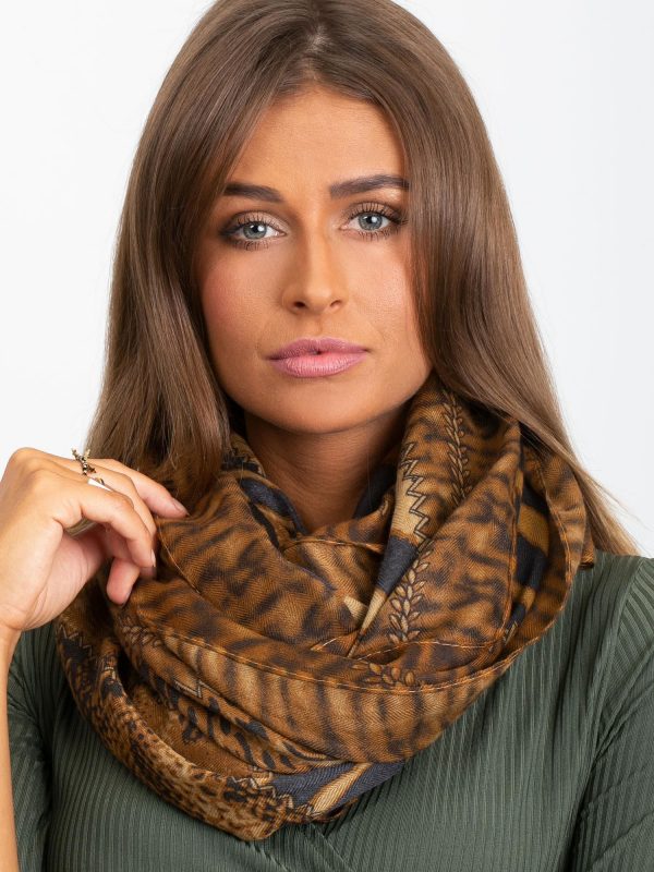 Light brown sling in animal pattern