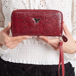 Burgundy wallet in embossed patterns