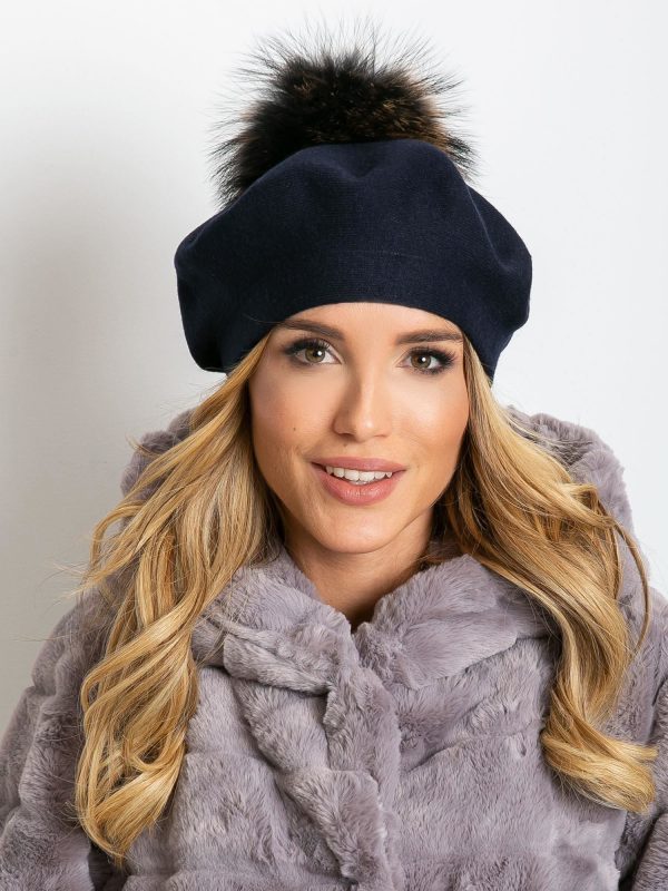 Navy blue knitted beret with tassel