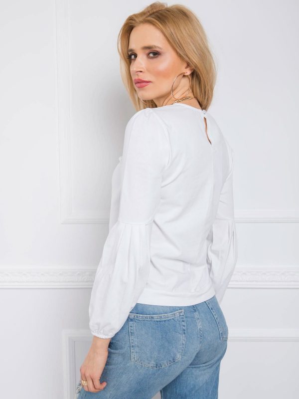 Kellie's white blouse