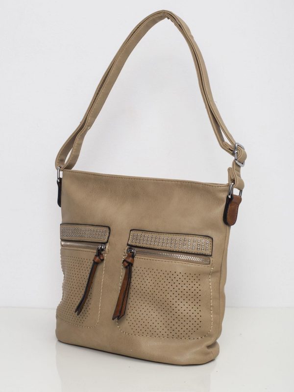 Dark beige bag with openwork pockets