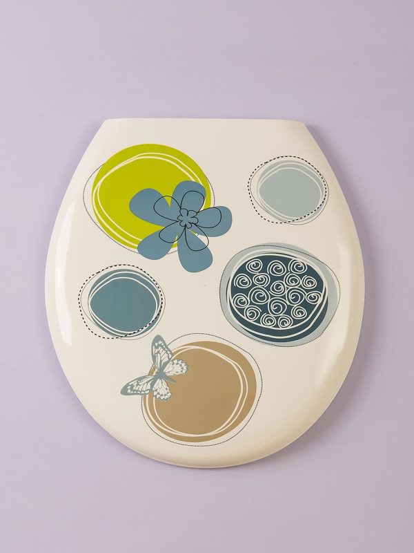 White toilet board with colorful patterns