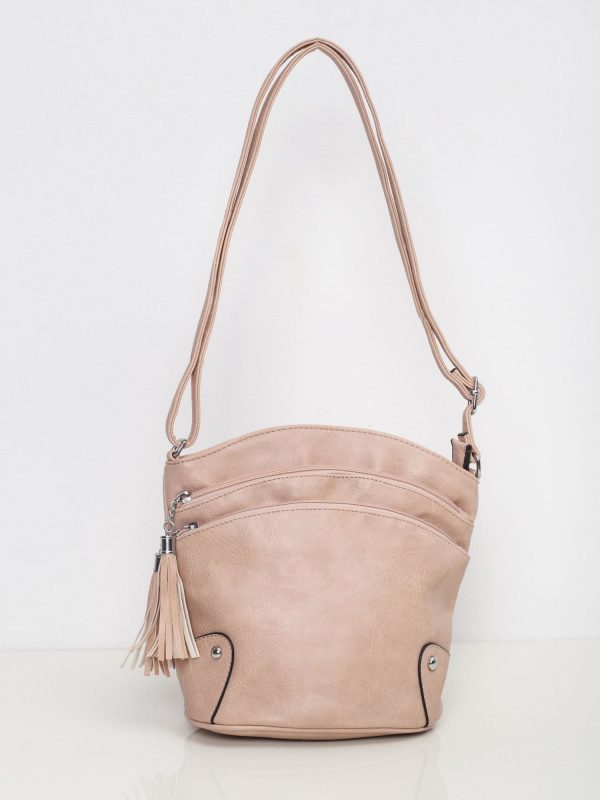 Pink handbag with zippers