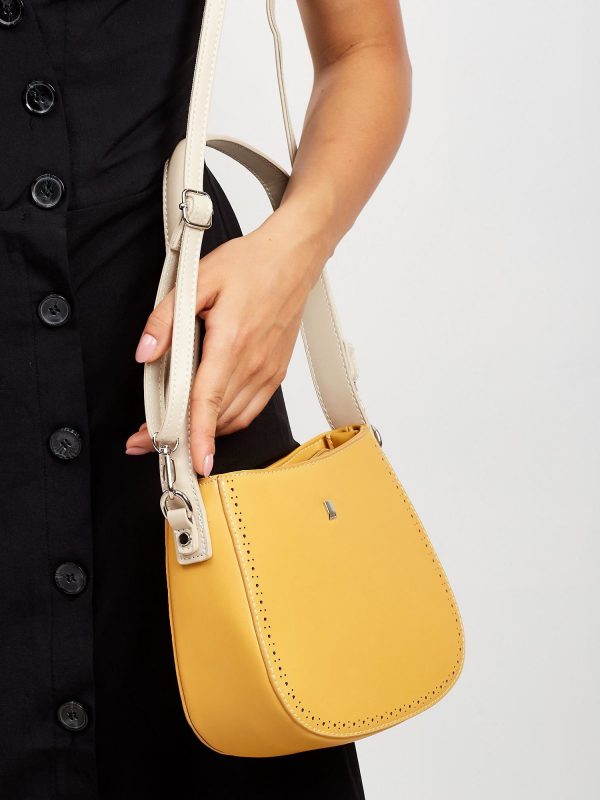 Yellow handbag with detachable strap