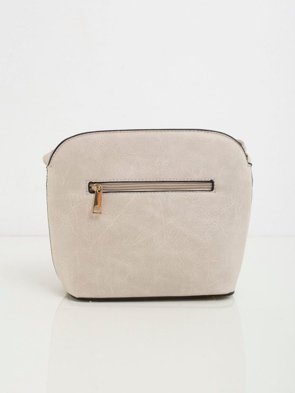 Beige women's handbag made of eco-leather