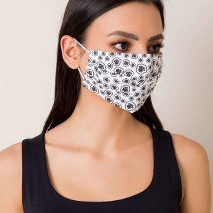 White and black protective mask in dog's feet