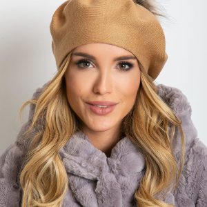 Beige knitted beret with pompom