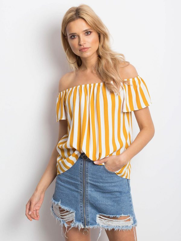 White and mustard blouse Attention