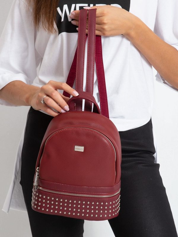 Red backpack with studs