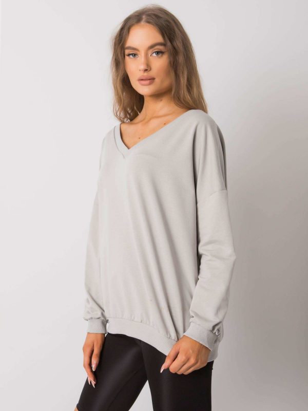 Lilyan's light gray hoodless sweatshirt