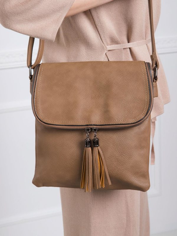 Dark beige tasseled handbag