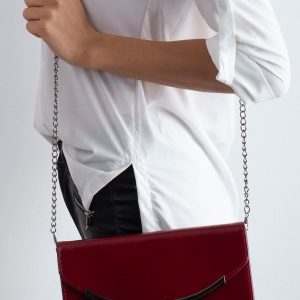 Burgundy clutch bag on a chain