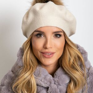 Light beige knitted beret with pompom