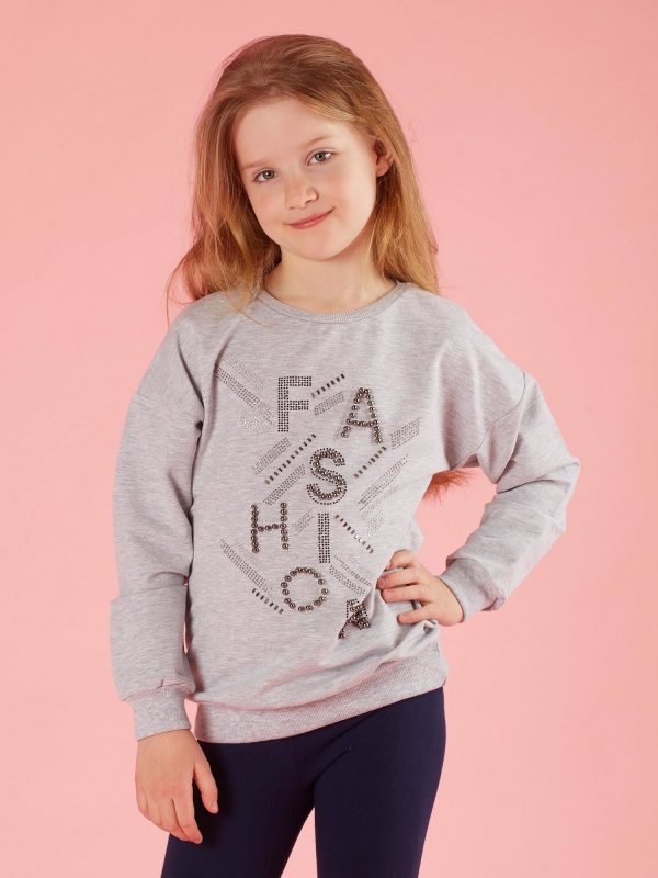 Light gray girl's sweatshirt with appliqués