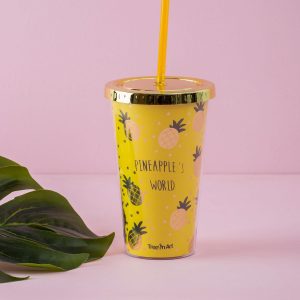 Yellow mug with straw