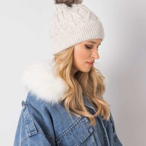 Beige hat for winter with pompom