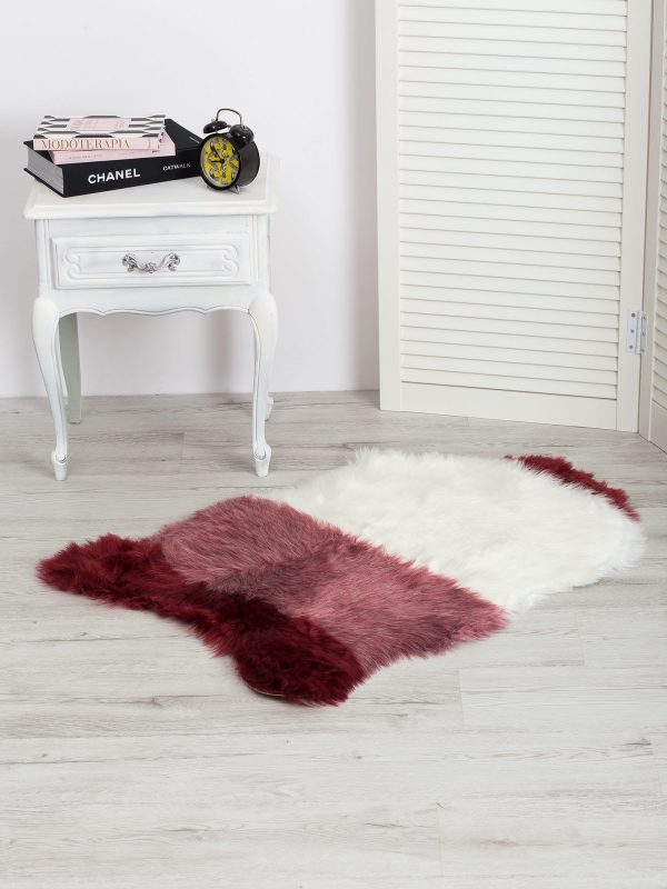 Burgundy and white fur rug