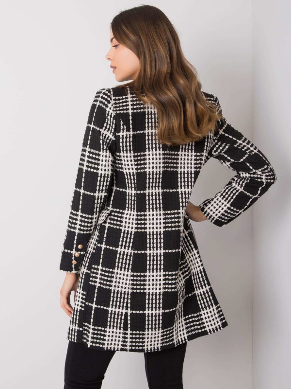 Peggy's black and white plaid coat