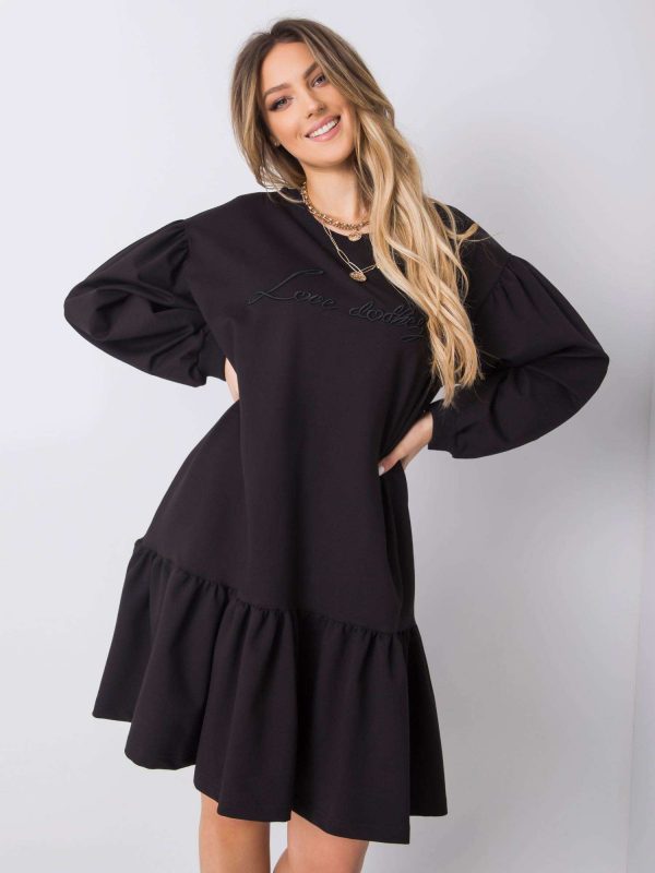 Janelle's black ruffle dress