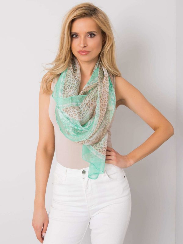 Green and beige scarf in animal patterns