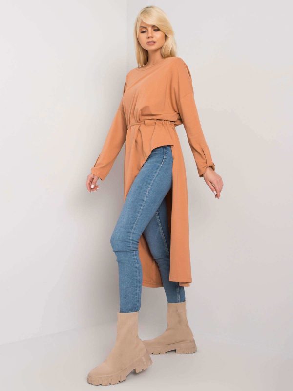 Brenda's light brown oversize cotton tunic