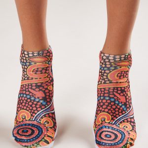 Women's feet with colorful print