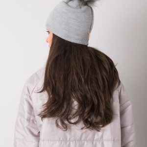 Grey padded women's hat with tassel