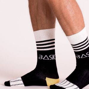 Black and ecru men's socks with patterns