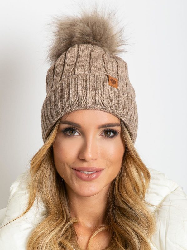 Dark beige winter hat with pompom