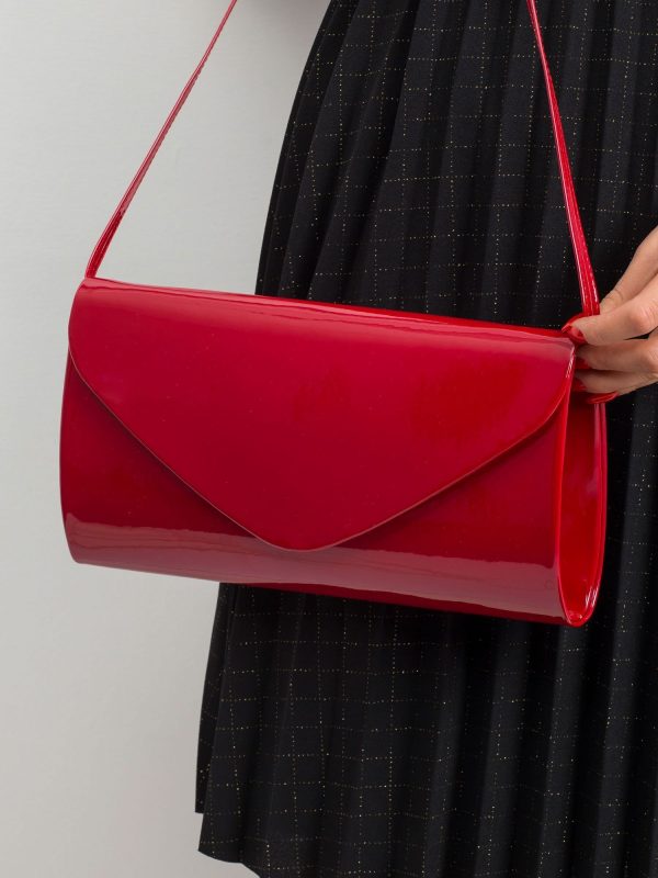 Dark red lacquered clutch bag