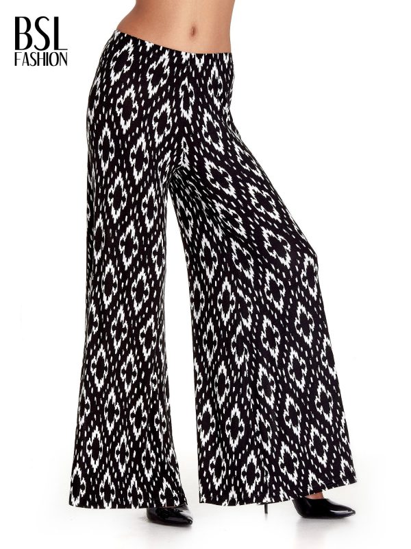 Black palazzo pants with geometric patterns