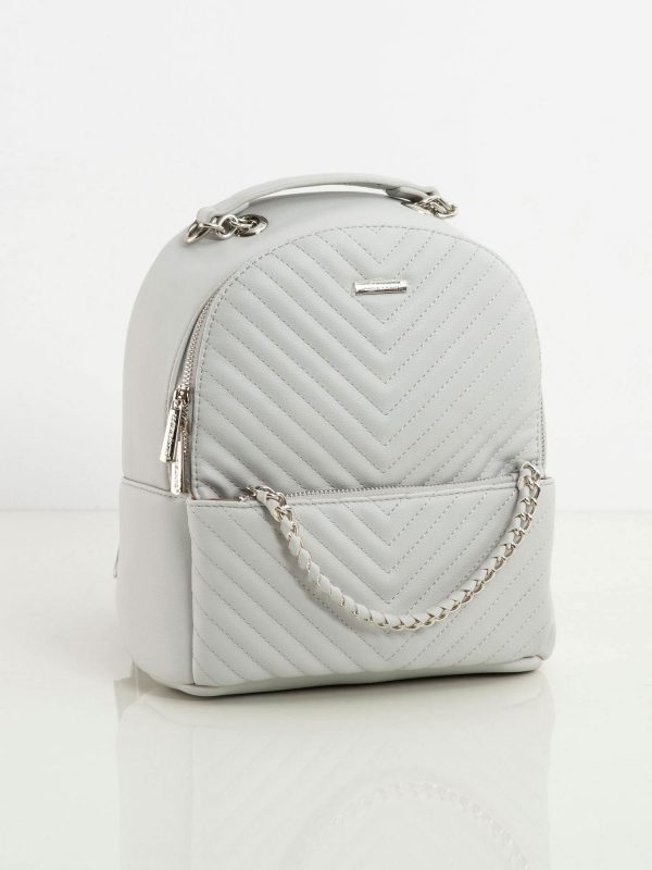 Light grey women's backpack with stitching