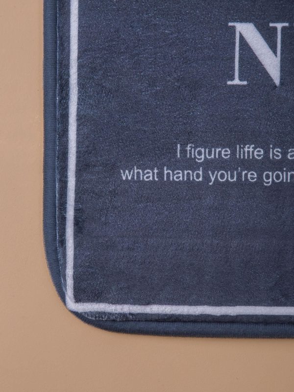 Dark gray floor mat with inscription