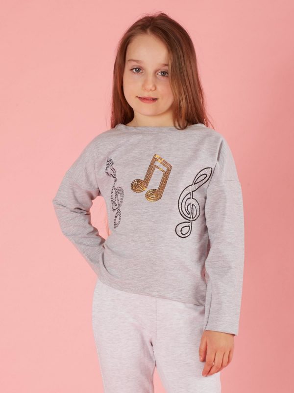 Grey girl blouse with musical applique