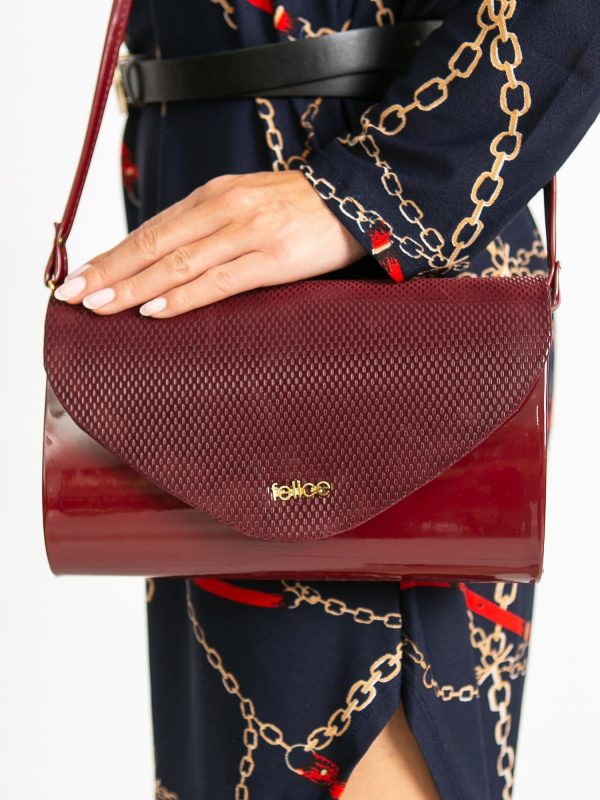 Burgundy clutch bag