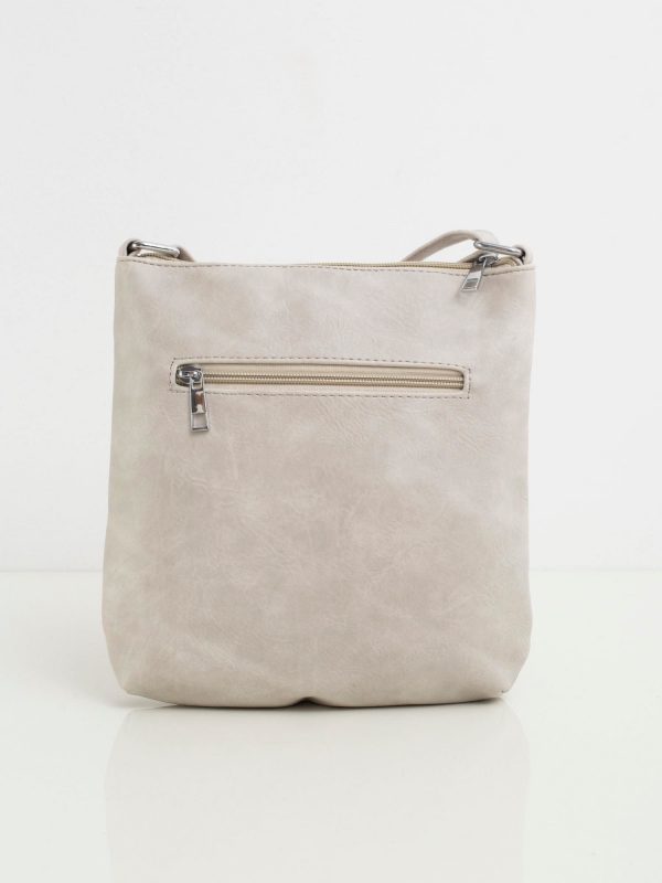 Light grey handbag with zippers