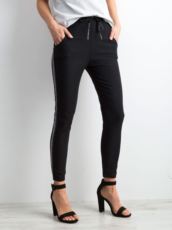 Black pants with shiny stripe