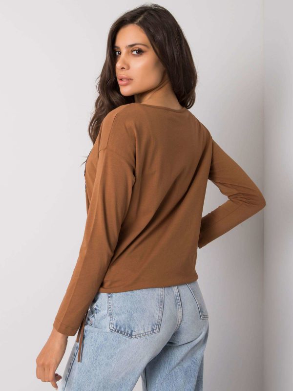 Light brown blouse with Romy applique