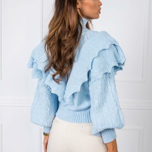 Rosie's light blue sweater