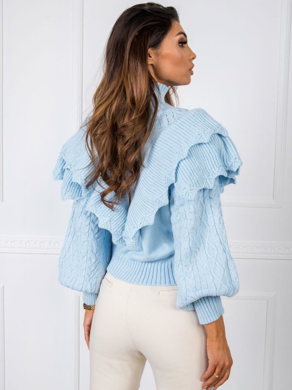 Rosie's light blue sweater