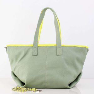 Green bag with decorative strap