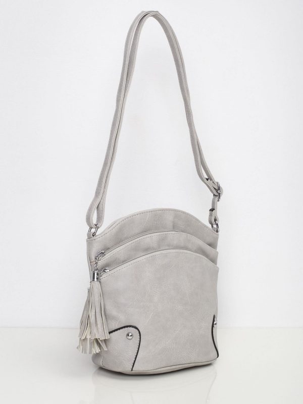 Grey handbag with zippers