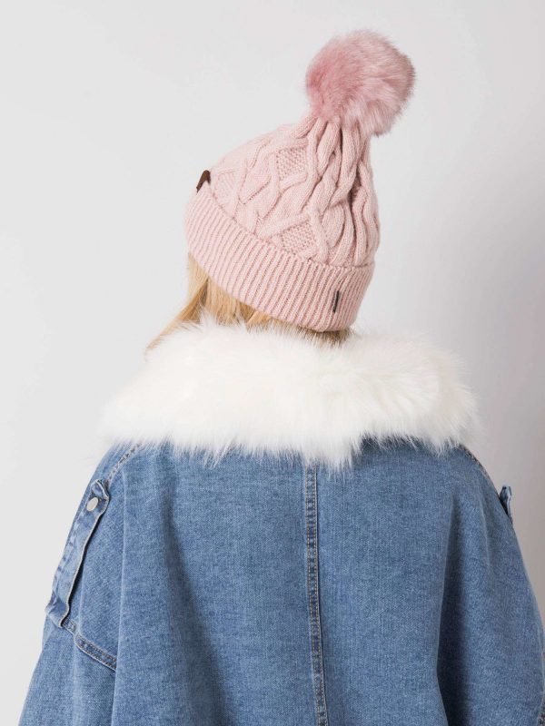 Light pink hat for winter with pompom