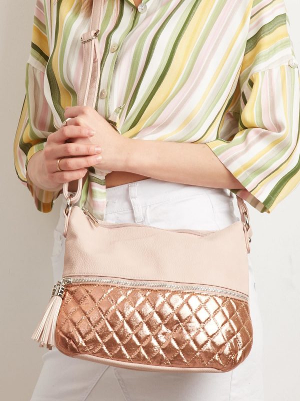 Light pink handbag with shiny quilted insert