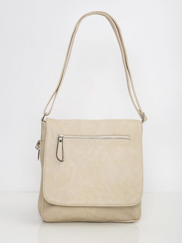 Beige women's handbag with flip