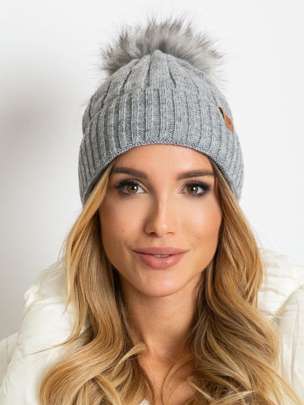 Gray winter hat with pompom