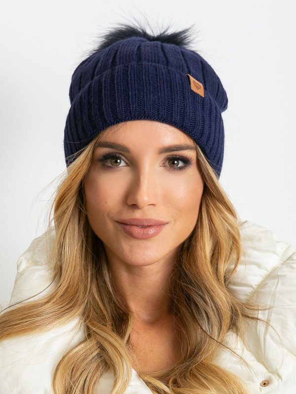 Navy blue winter hat with pompom